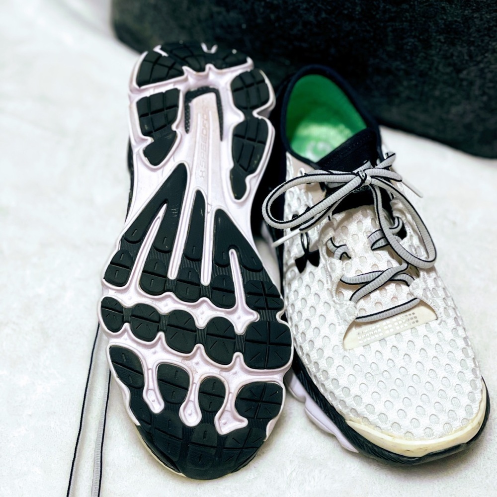 Under armor tennis shoes.